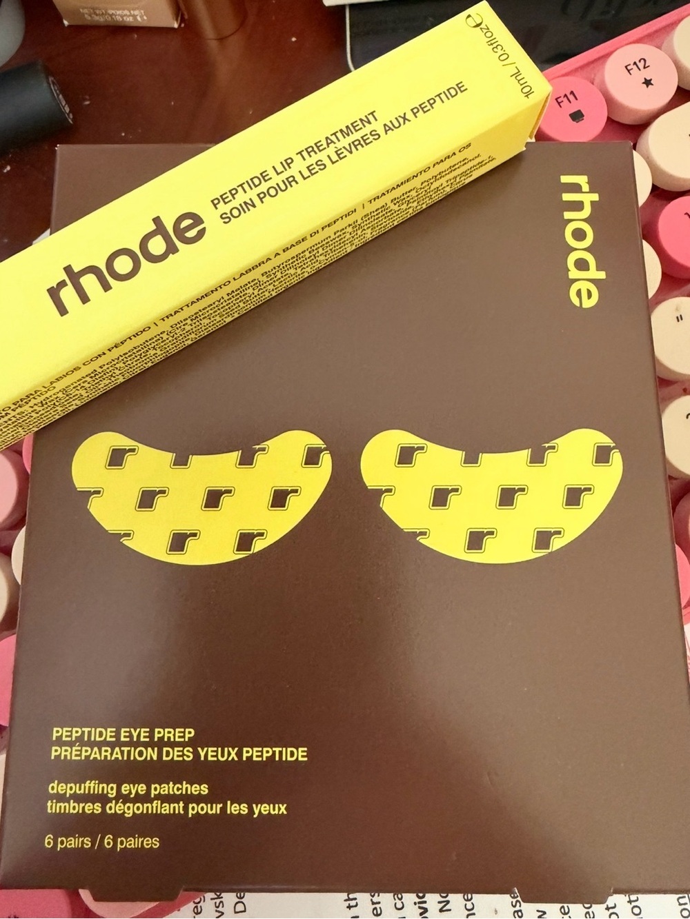 RHODE Peptide Eye Prep Eye Patches and caramelized Banana Lip Treatment